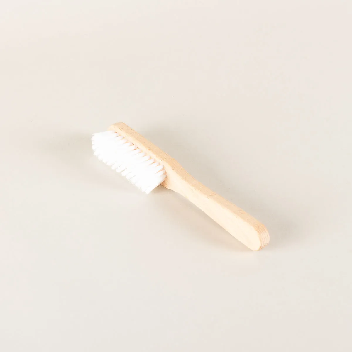 White cleaning brush
