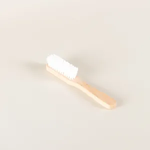 White cleaning brush